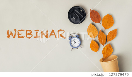 White background with a blue clock and a cup of coffee 127279479