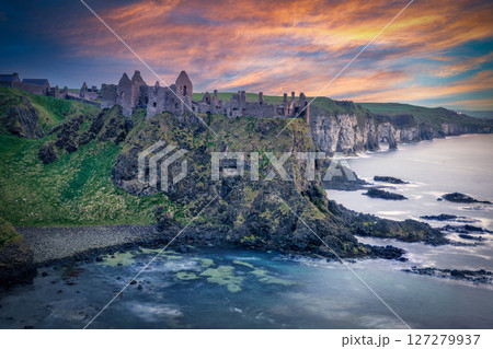 Dunluce Castle at Sunset Dramatic Sky and Reflections on the Sea, Northern Ireland 127279937