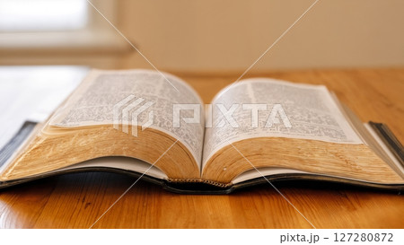 Minimalist Open Bible, Soft Light, Contemplation, and Spiritual Study. Excellent for scripture resources, theological education, and personal devotionals. 127280872