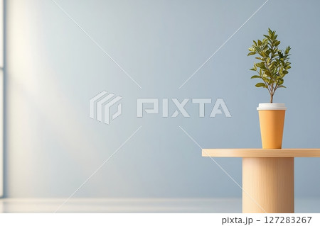 Stylish Freelancer Workspace with Laptop, Coffee, and Indoor Plant for Inspiration and Productivity Boost 127283267