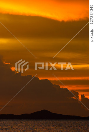 sunset over sea sunset over sea 127284349