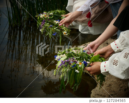 Midsummer solstice holiday with flower wreath Midsummer solstice holiday with flower wreath 127284565
