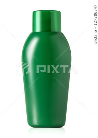Green plastic shampoo bottle with closed cap isolated on white background with clipping path Green plastic shampoo bottle with closed cap isolated on white background with clipping path 127286547