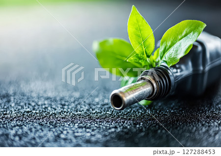 Bottle of gas with a leaf on top Bottle of gas with a leaf on top 127288453
