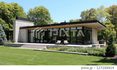 Modern Stone and Glass House with Patio and Landscaping 127288924