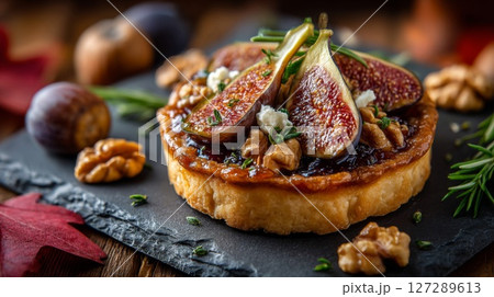 Sweet Fig and Walnut Tart with Goat Cheese 127289613
