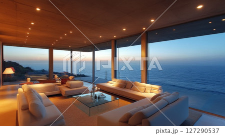 Modern Living Room with Ocean View and White Couches 127290537