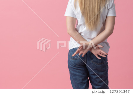 Woman in Casual Wear Holding Lower Back Woman in Casual Wear Holding Lower Back 127291347