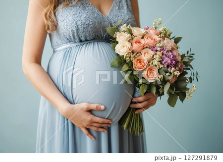 pregnant woman with flowers 127291879