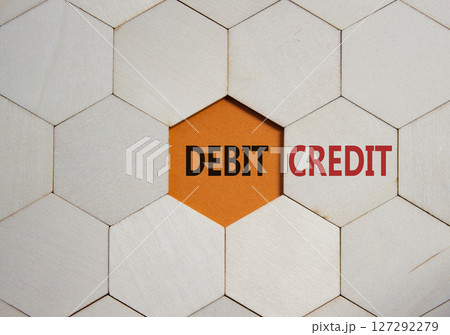 Lend or Borrow symbol. Concept word Lend or Borrow on wooden comb puzzle. Beautiful orange background. Business and Lend or Borrow concept. Copy space Lend or Borrow symbol. Concept word Lend or Borrow on wooden comb puzzle. Beautiful orange background. Business and Lend or Borrow concept. Copy space 127292279