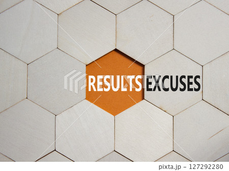Results or Excuses symbol. Concept word Results or Excuses on wooden comb puzzle. Beautiful orange background. Business and Results or Excuses concept. Copy space Results or Excuses symbol. Concept word Results or Excuses on wooden comb puzzle. Beautiful orange background. Business and Results or Excuses concept. Copy space 127292280