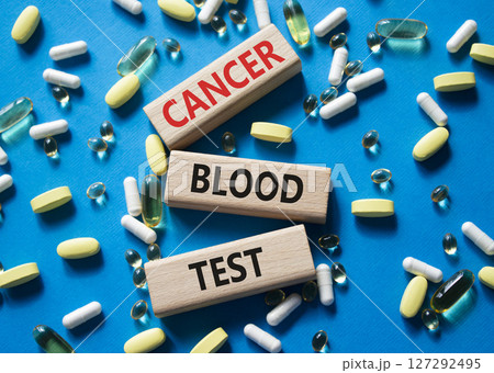 Cancer Blood Test symbol. Concept word Cancer Blood Test on wooden blocks. Beautiful blue background with pills. Medicine and Cancer Blood Test concept. Copy space Cancer Blood Test symbol. Concept word Cancer Blood Test on wooden blocks. Beautiful blue background with pills. Medicine and Cancer Blood Test concept. Copy space 127292495