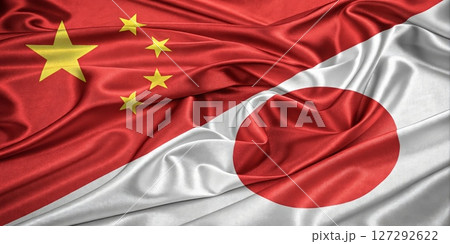 Flags of China and Japan Woven Together Representing Unity and Cultural Exchange 127292622