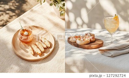 Summer brunch scene with artisan crostini and spritz cocktail in cozy countryside mood. 127292724