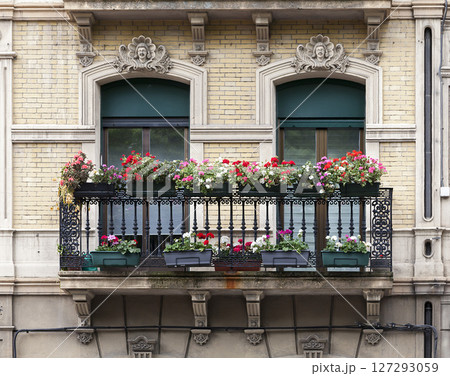 Ornate balconies on a historic building Ornate balconies on a historic building 127293059