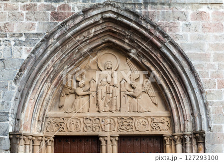 Discovering the carved entrance of a historic church in Roncesvalles along the Camino de Santiago Discovering the carved entrance of a historic church in Roncesvalles along the Camino de Santiago 127293100