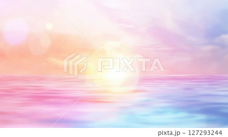 Artistic blurred sunrise scene with pastel hues, perfect for serene landscapes, backgrounds, and creative designs. 127293244