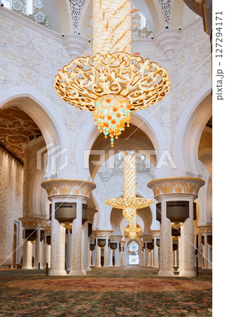 View of Sheikh Zayed Grand Mosque in Abu Dhabi. Inside mosque with famous huge seamless carpet. Vertical photo 127294171