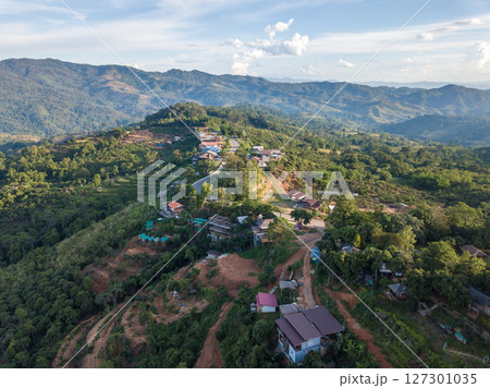 Aerial view of small village situated on mountain nearly Phu Lung ka forest park in Phayao province of Thailand. 127301035