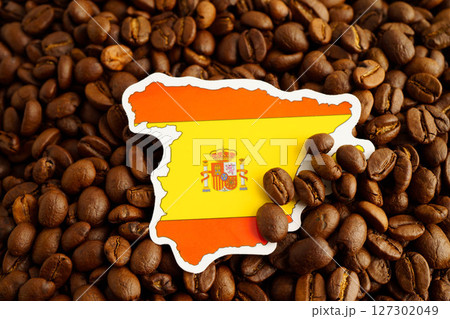 Spain flag on coffee beans, shopping online for export or import food product. Spain flag on coffee beans, shopping online for export or import food product. 127302049
