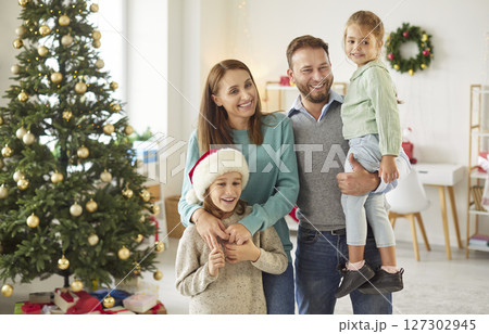 Portrait Of A Happy Family With Children During Christmas Or New Year At Home Portrait Of A Happy Family With Children During Christmas Or New Year At Home 127302945