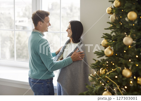 Family Couple Spending Leisure Time At Home During Christmas Or New Year Family Couple Spending Leisure Time At Home During Christmas Or New Year 127303001