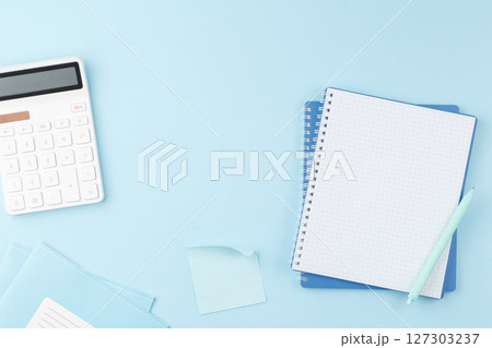 Notebook with pencil on the school desk. Notebook with pencil on the school desk. 127303237
