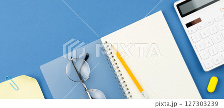 Notepad, pencil, calculator, note sheet, glasses. 127303239
