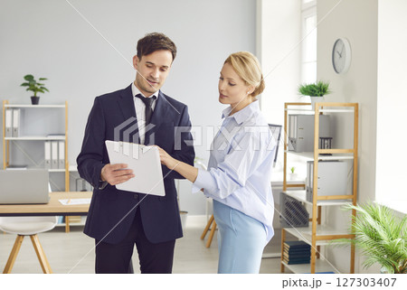 Successful Business Colleagues Discussing In Office Meeting Successful Business Colleagues Discussing In Office Meeting 127303407