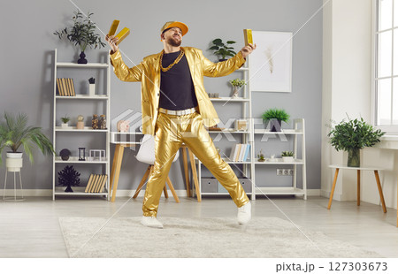 Rich Man Dancing With Gold Bars At Home Rich Man Dancing With Gold Bars At Home 127303673