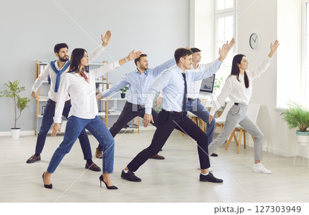Business people office group yoga, healthy lifestyle break during work, young office workers Business people office group yoga, healthy lifestyle break during work, young office workers 127303949