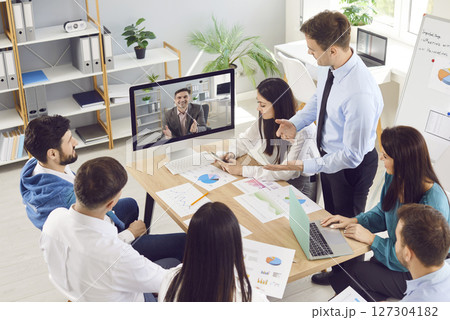 Office people, employees talking on video call with male colleague or business partner, communicate  127304182
