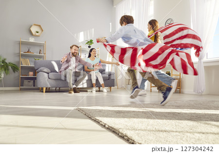 Happy American Family Celebrating Independence Day At Home Happy American Family Celebrating Independence Day At Home 127304242