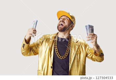 Happy Rich Man Celebrating Financial Success With Cash Happy Rich Man Celebrating Financial Success With Cash 127304533