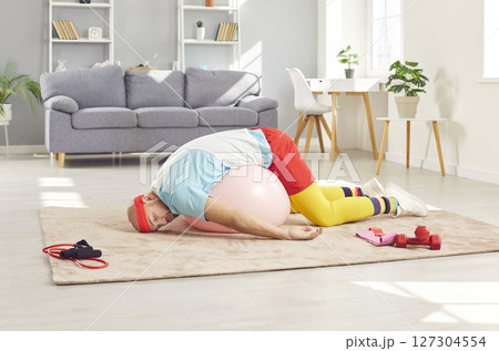 Lazy Or Tired Funny Man Sleeping On The Floor During Home Workout Lazy Or Tired Funny Man Sleeping On The Floor During Home Workout 127304554