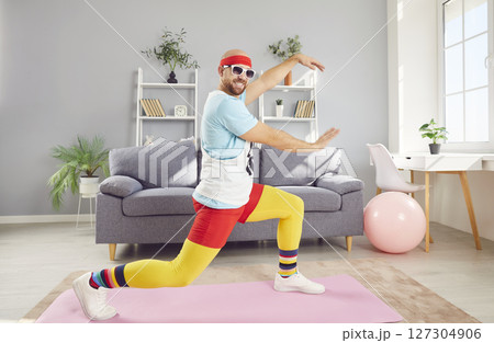 Funny Man Dancing Or Working Out At Home Gym 127304906