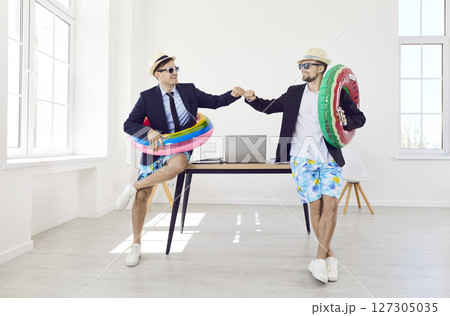 Funny office workers, employees dreaming of annual leave, vacation, wearing formal wear, summer Funny office workers, employees dreaming of annual leave, vacation, wearing formal wear, summer 127305035