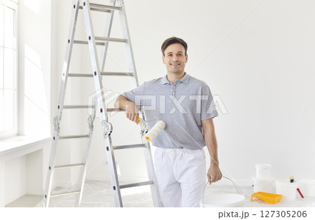 Portrait Of Happy Man Painter Working During Home Renovation 127305206