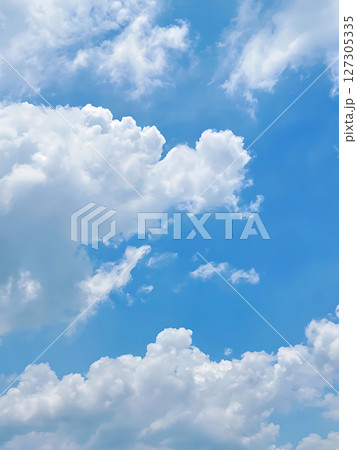 Vivid Cumulus Clouds Against a Bright Blue Sky. Vivid Cumulus Clouds Against a Bright Blue Sky. 127305335