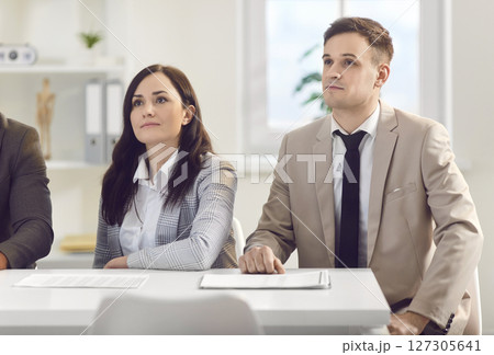 Colleagues Engaged In A Productive Office Meeting Or Conference 127305641