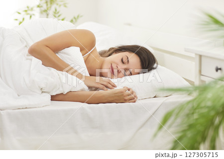 Happy Woman Sleeping Or Napping On Bed At Home In The Early Morning 127305715