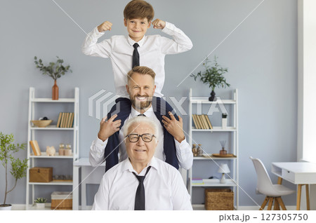 Happy funny family of three generation men, grandfather, father, son, cute child grandson playing  Happy funny family of three generation men, grandfather, father, son, cute child grandson playing  127305750