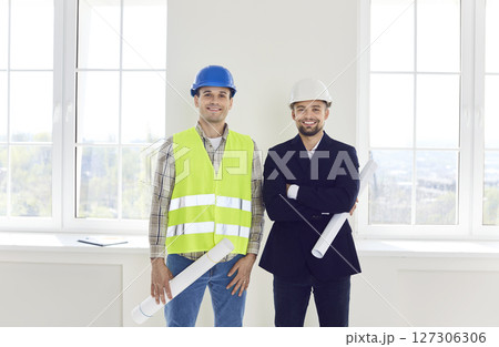 Happy Architect And Businessman During Home Or Office Renovation Happy Architect And Businessman During Home Or Office Renovation 127306306