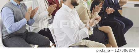 Office crowd excitement, employees applauding congratulating team with business achievement Office crowd excitement, employees applauding congratulating team with business achievement 127306874
