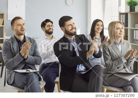 Happy friendly diverse employees applauding congratulating with business achievement, great work 127307200