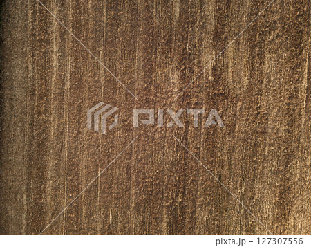 Aerial view background of plowed field Aerial view background of plowed field 127307556