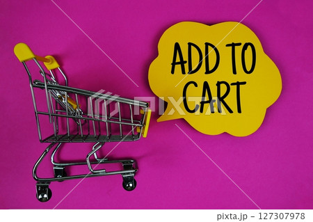 Add to Cart text with speech bubble and trolley shopping cart on pink background Add to Cart text with speech bubble and trolley shopping cart on pink background 127307978