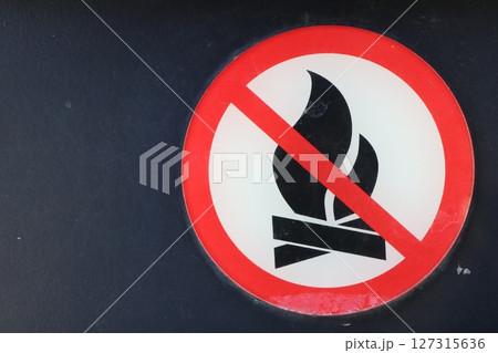 Warning Sign Indicating the Prohibition of Open Flames in Public Spaces and Environments 127315636