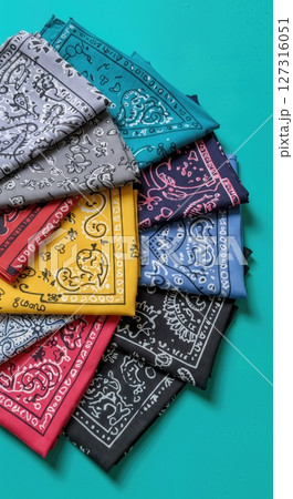 Vibrant Multicolor Paisley Bandana Collection Arranged in Fan Shape on Turquoise Background, Classic Cotton Kerchiefs in Assorted Colors for Fashion, Crafts, and Western Decor 127316051