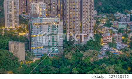 June 10 2025 View of Modern Buildings Surrounded by Lush Green Urban Landscape June 10 2025 View of Modern Buildings Surrounded by Lush Green Urban Landscape 127318136